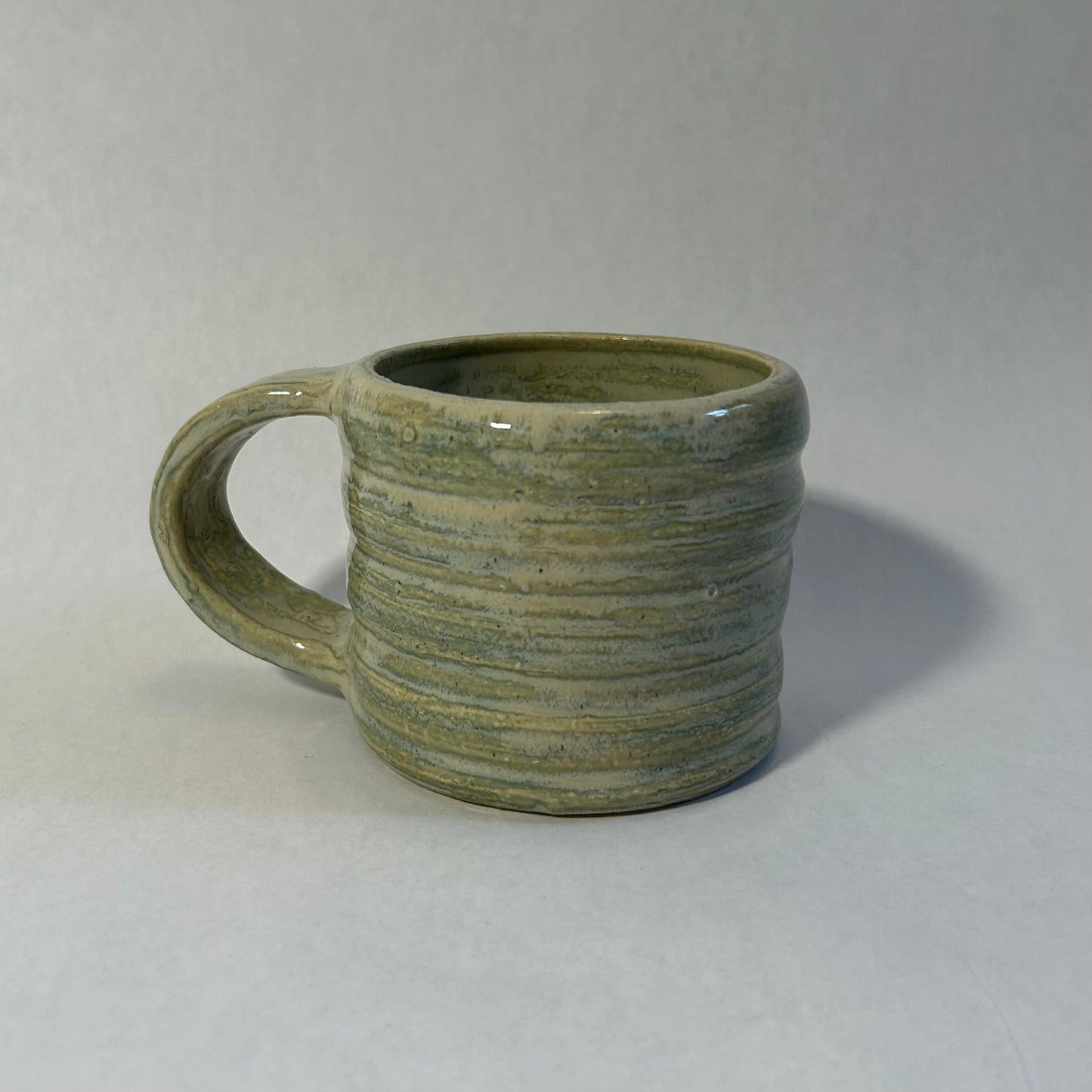green squiggly mug