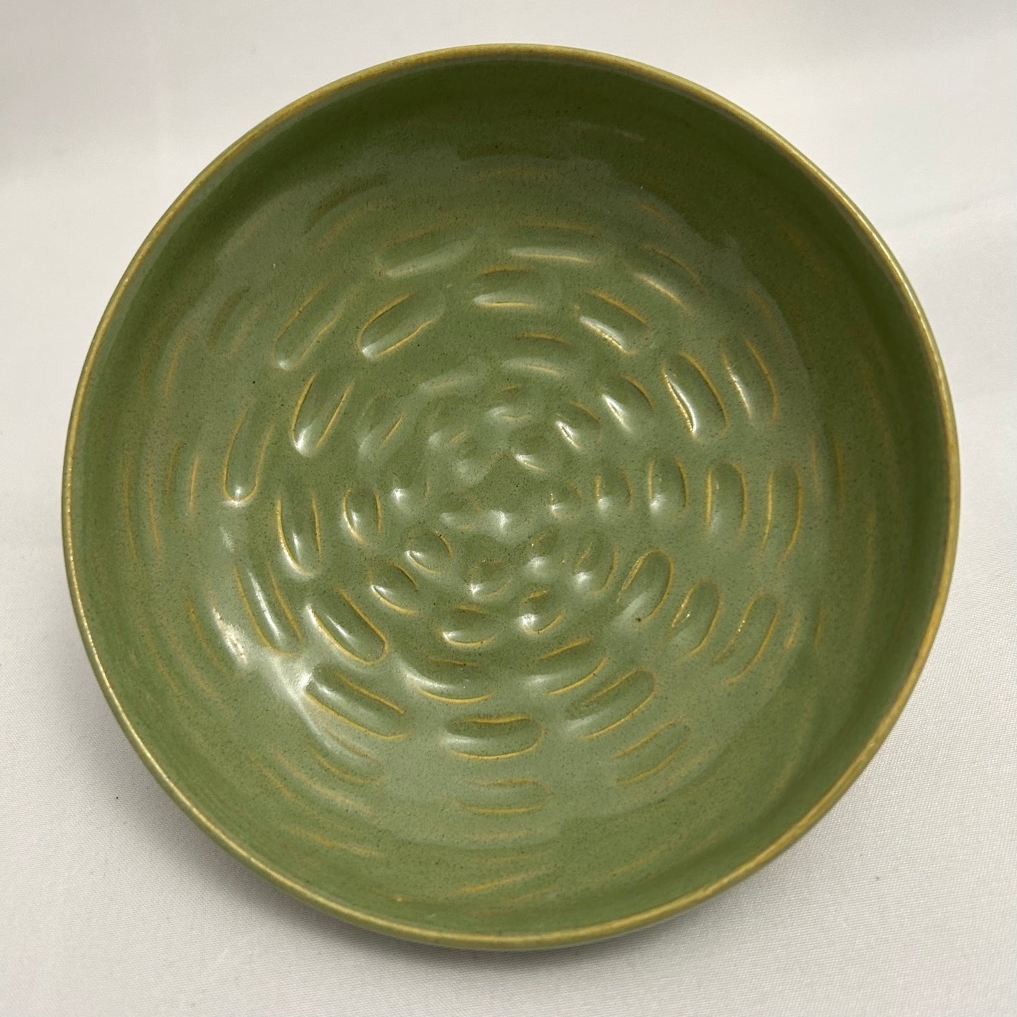 green carved spiral bowl