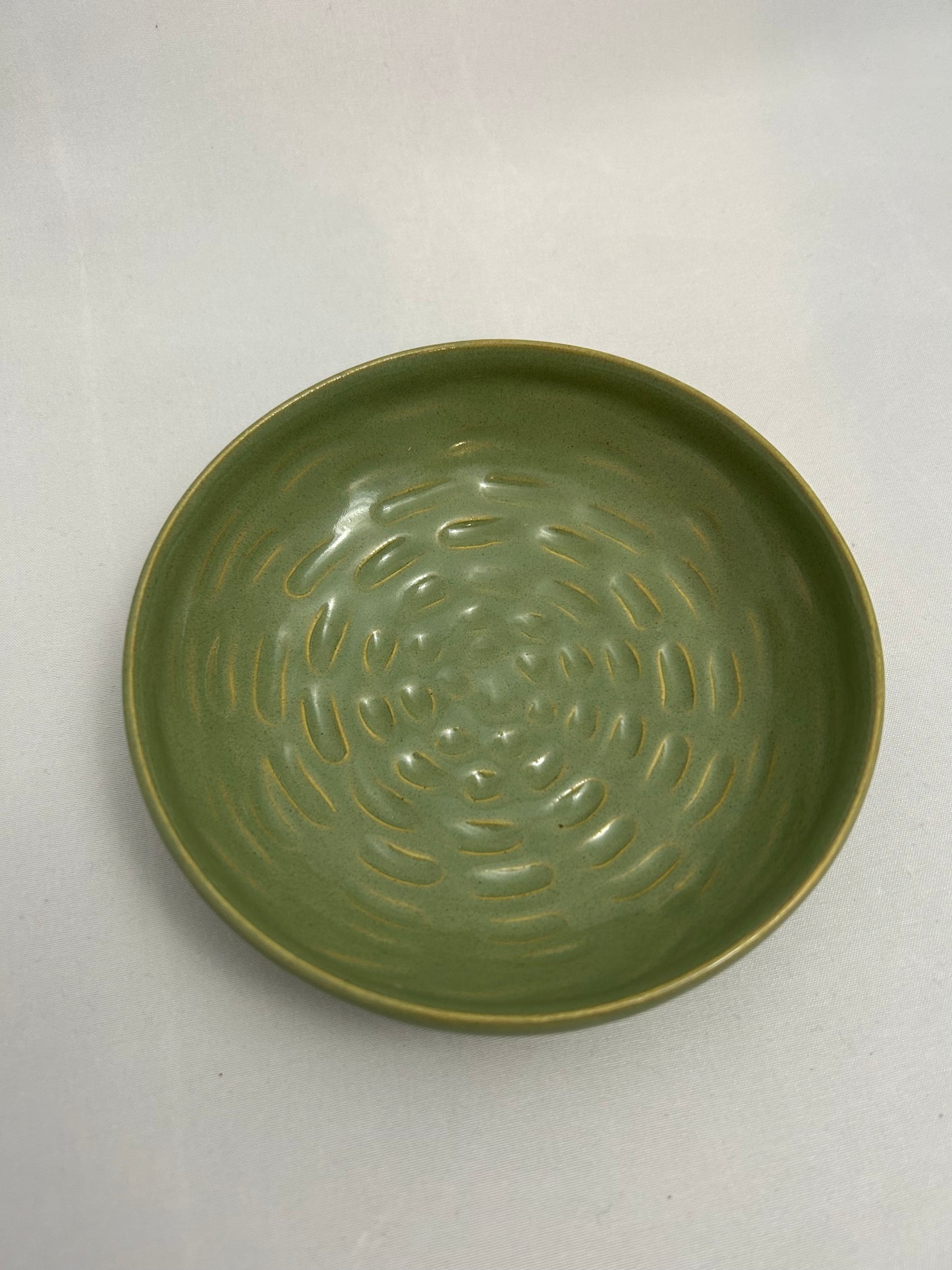 green carved spiral bowl